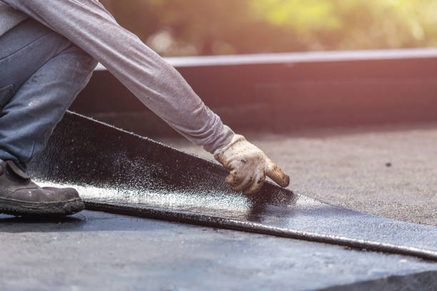 Professional Exterior Waterproofing technician working in Corunna, MI